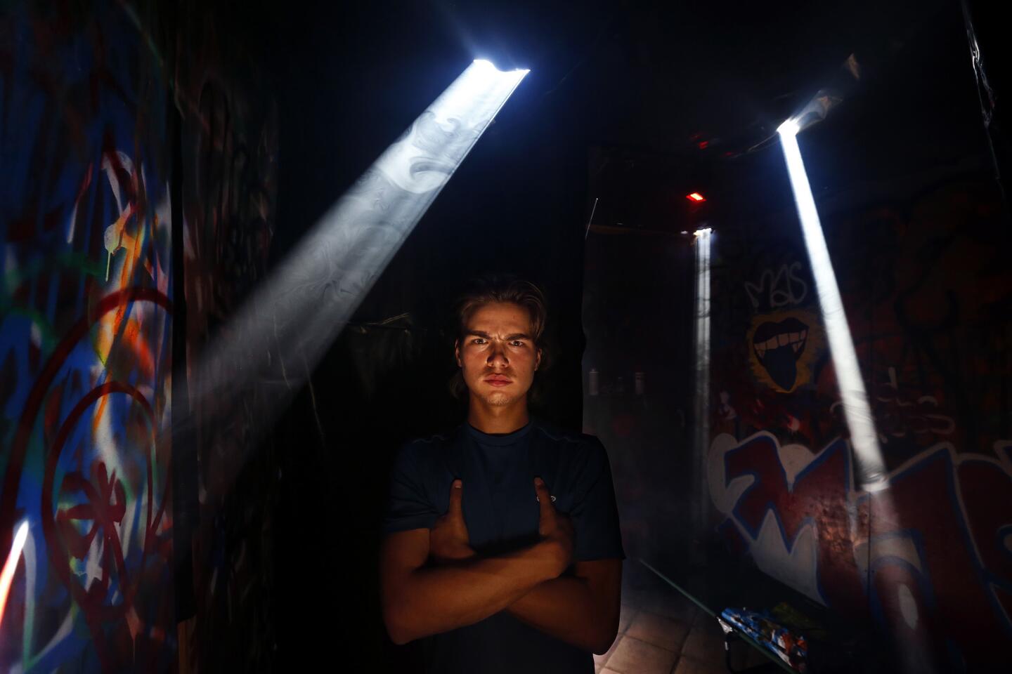 Timur Bootzin inside a haunted maze that he designed in front of his home in Los Feliz.