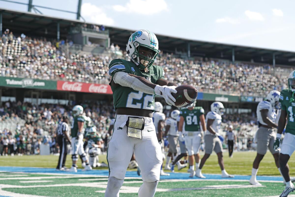 Tulane running back Tyjae Spears holds the ball during a game against Memphis on Oct. 22.