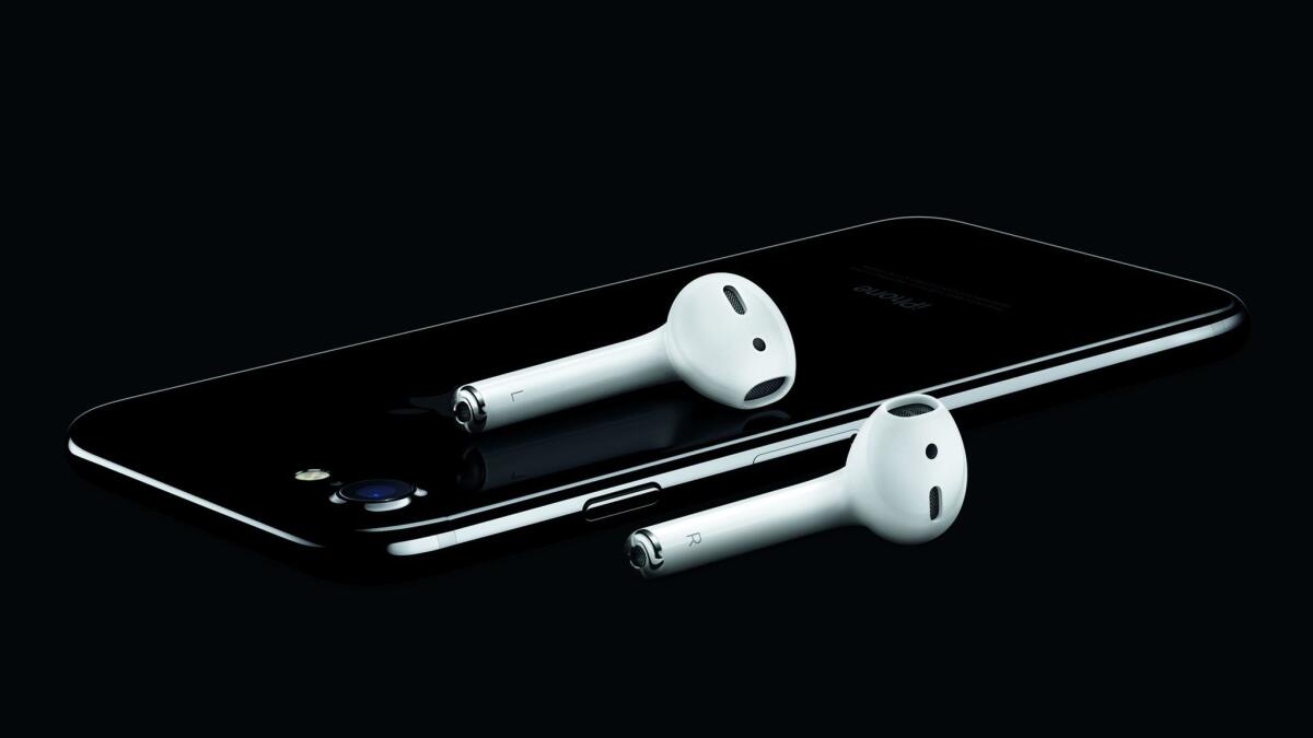 An iPhone 7 with wireless AirPods. (Apple / TNS)