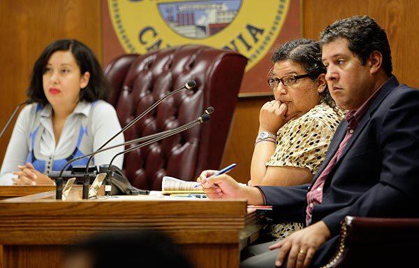 Maywood Mayor Ana Rosa Rizo, left, Mayor Pro Tem Veronica Guardado and Councilman Thomas Martin listen to public comments at the City Council meeting Monday night.