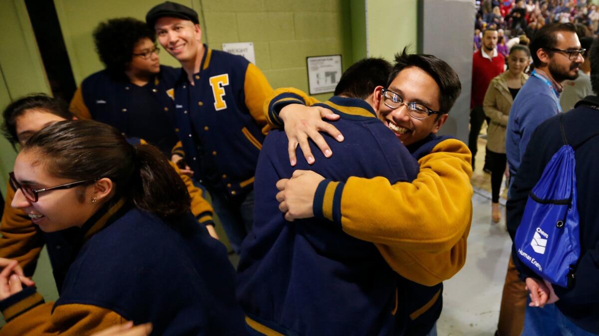 Franklin High School students celebrate Saturday during the Super Quiz portion of L.A. Unified School District's Academic Decathlon. The top scoring school was Marshall High, but Franklin, located in Highland Park, finished a strong fourth among 62 teams.