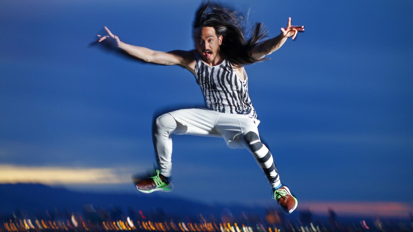 Grammy-nominated music producer and EDM musician and DJ Steve Aoki is photographed at his home, with a view of the Las Vegas Strip, June 14, 2014. Aoki, moving to Las Vegas, has committed to a regular show at Hakkasan nightclub, inside the MGM Grand Hotel & Casino.