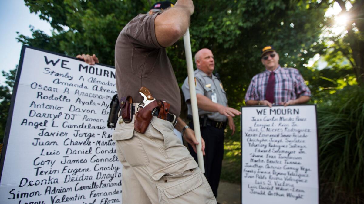 Pro-gun demonstrators rally outside NRA headquarters in Fairfax, Va. in June.