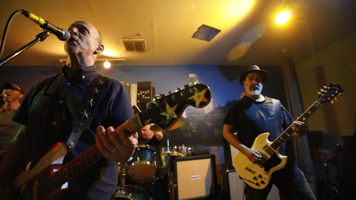 Wayne Kramer,of the MC5, second from left, rehearses for upcoming tour with Dug Pinnick, left, Brendan Canty, center, guitarist Kim Thayil, right.