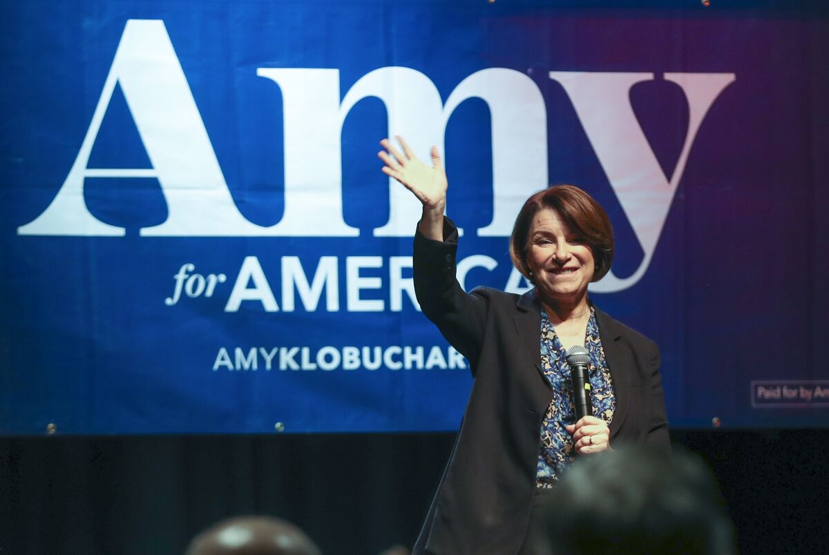 Democratic presidential candidate Minnesota Sen. Amy Klobuchar waves to her supporters after speaking during her presidential campaign rally at The Depot in Salt Lake City on Monday, March 2, 2020. (Steve Griffin/The Deseret News via AP)