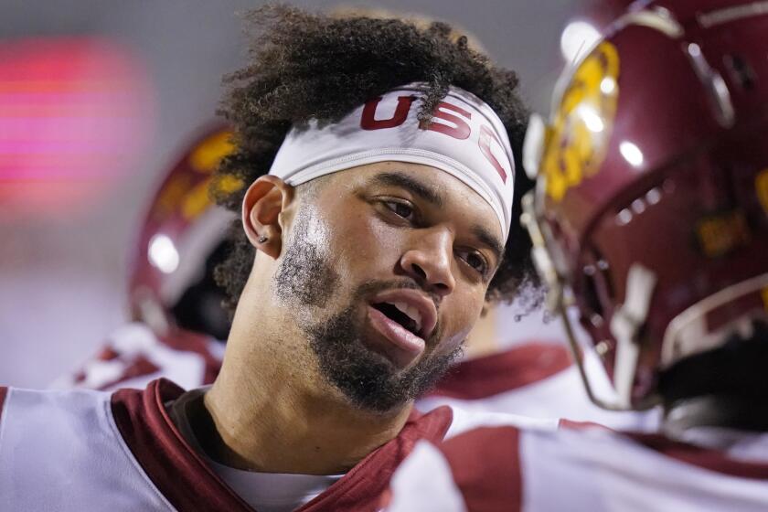 USC quarterback Caleb Williams stands on the sideline during the team's loss to Utah