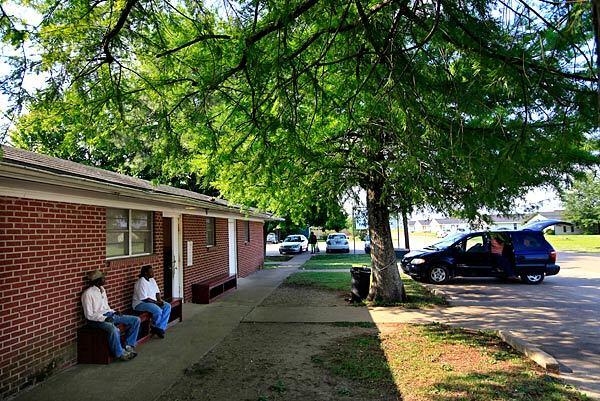 Patients wait outside the Tutwiler Clinic in Mississippi Delta country. The state has the highest rates of poverty and heart disease in the nation and the second-highest rate of diabetes.