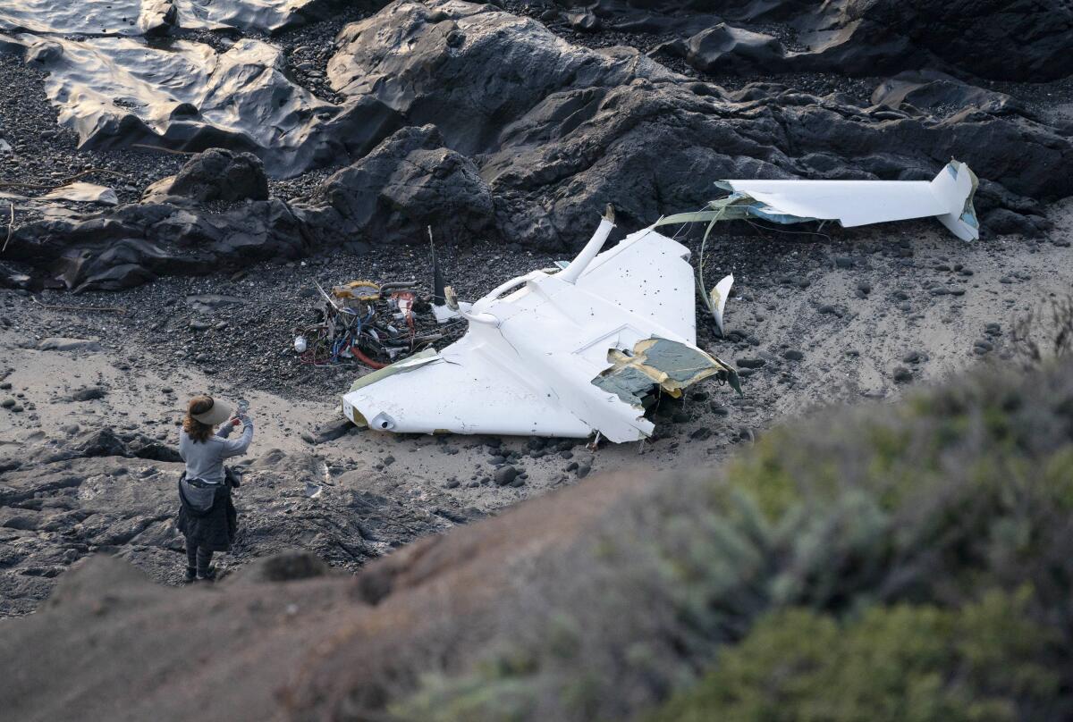 SAN MATEO, CALIFORNIA - JANUARY 15: The wreckage is seen after a small plane crashes in the waters off Half Moon Bay on January 15, 2024 in San Mateo County, California. A woman's body was found near the plane crash site. (Photo by Liu Guanguan/China News Service/VCG via Getty Images)