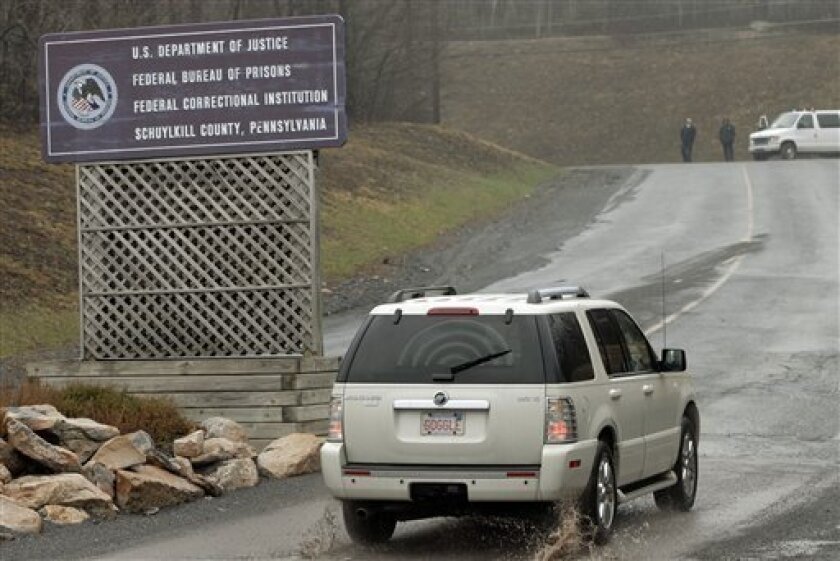 An SUV arrives at the Federal Correctional Institution - Schuylkill in Minersville, Pa., Tuesday, April 14, 2009. Federal officials say former Qwest CEO Joe Nacchio has reported to the prison to start a six-year sentence for insider trading while he appeals his conviction to the Supreme Court. (AP Photo/Bradley C Bower)