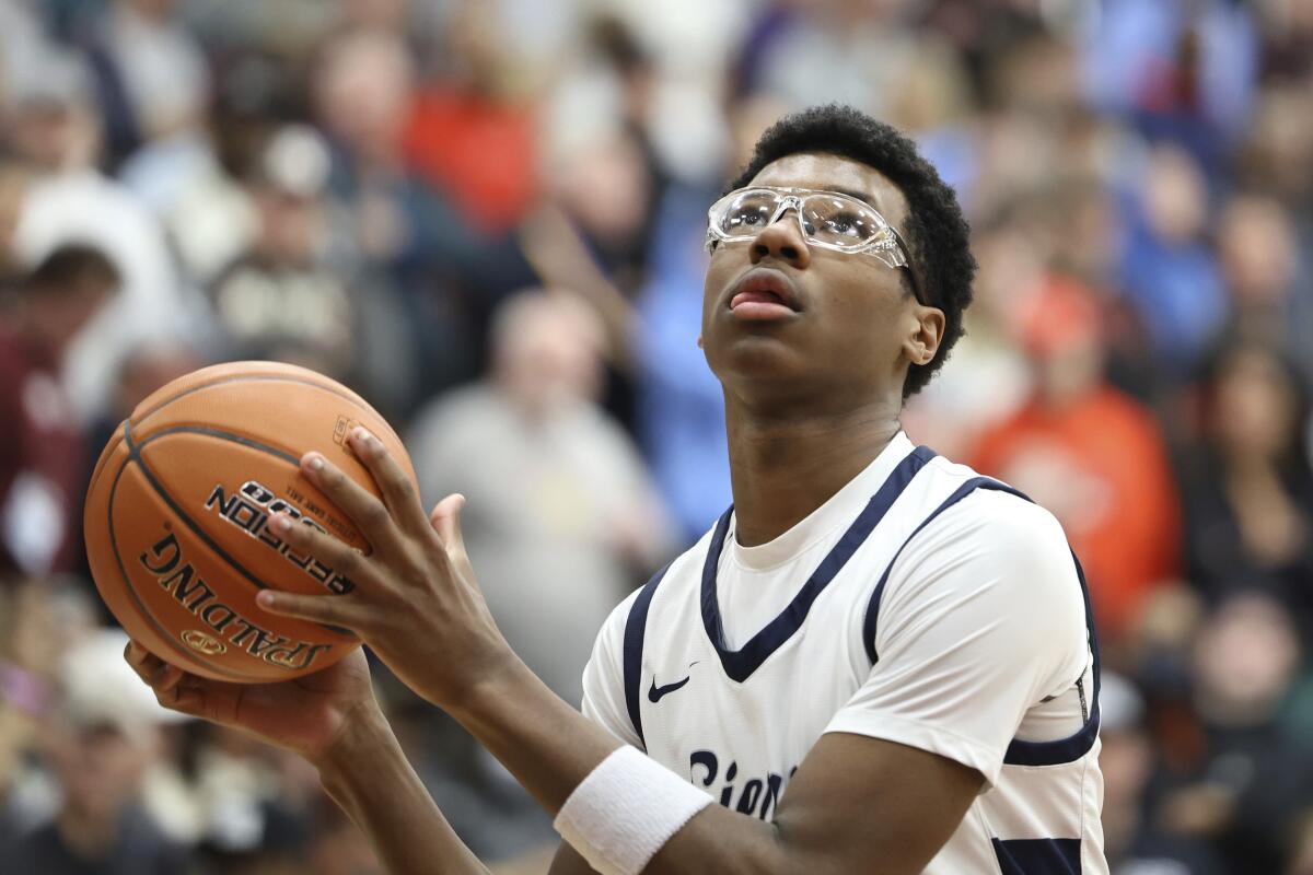 Sierra Canyon's Bryce James warms up before the second half against Christopher Columbus