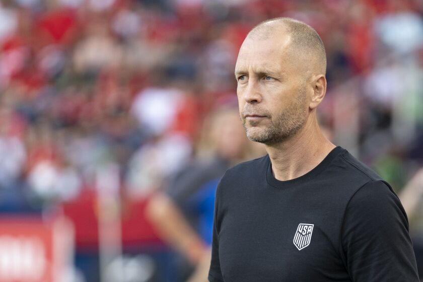 U.S. men's national team coach Gregg Berhalter stands in the technical area prior to a 2022 match 