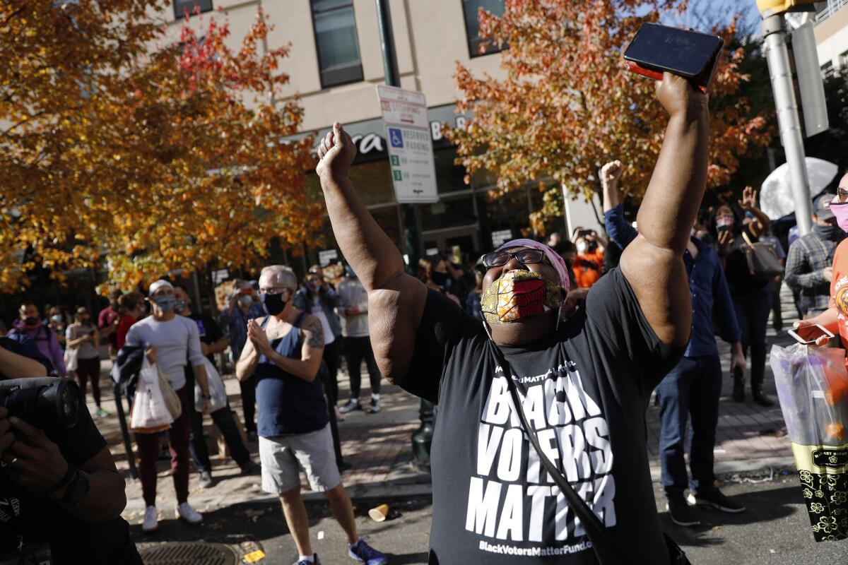 People celebrate in Philadelphia after the presidential election was called for Joe Biden and Kamala Harris on Nov. 7. 