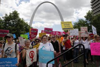 FILE - Abortion-rights supporters take part in a protest, May 30, 2019, in St. Louis. (AP Photo/Jeff Roberson, File)