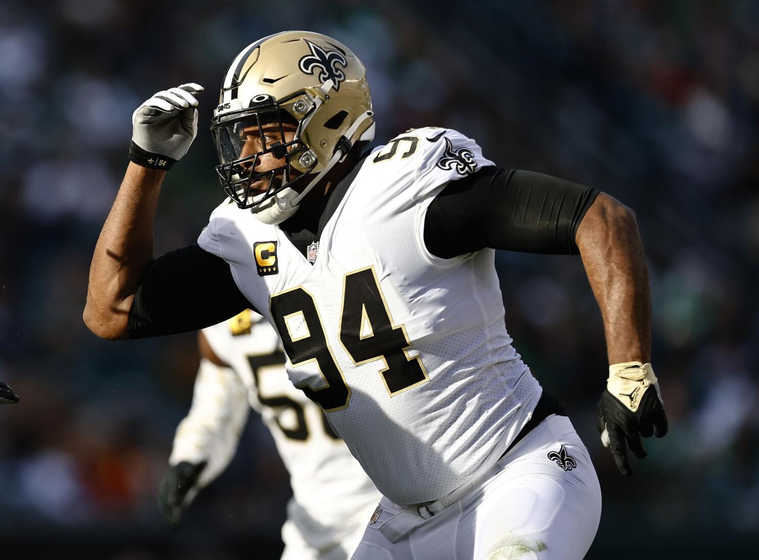 New Orleans Saints defensive end Carl Granderson signs a four-year