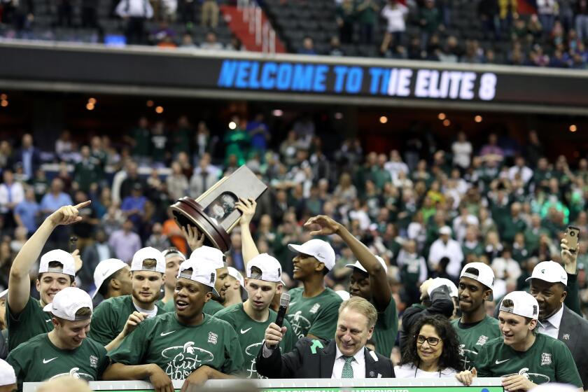 WASHINGTON, DC - MARCH 31: The Michigan State Spartans celebrate after defeating the Duke Blue Devils in the East Regional game of the 2019 NCAA Men's Basketball Tournament at Capital One Arena on March 31, 2019 in Washington, DC. The Michigan State Spartans defeated the Duke Blue Devils with a score of 68 to 67. (Photo by Rob Carr/Getty Images)