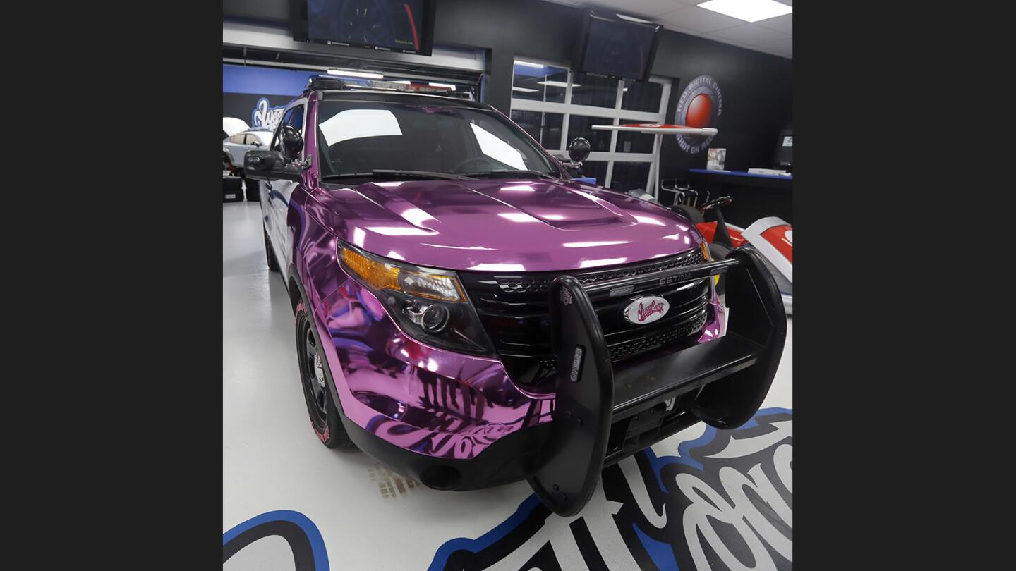 Photo Gallery: Burbank Police Dept. unveiled a chrome pink police vehicle for Breast Cancer Awareness month