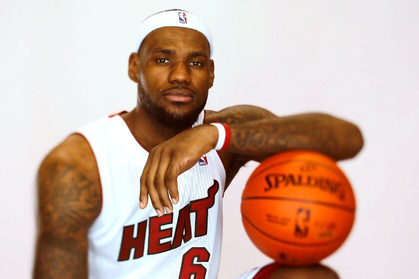 LeBron James #6 of the Miami Heat poses during media day at American Airlines Arena on December 12, 2011 in Miami, Fla.