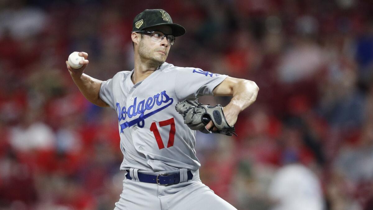 Dodgers reliever Joe Kelly delivers against the Cincinnati Reds on May 17. Kelly has been throwing more curveballs in recent outings.