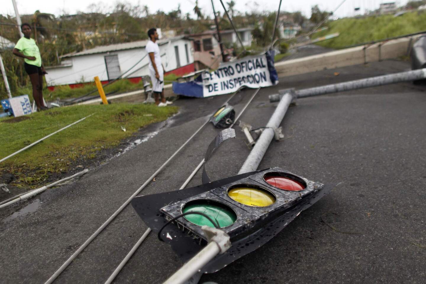 Downed traffic lights and power lines are seen in the aftermath of Hurricane Maria in Luquillo, Puerto Rico.