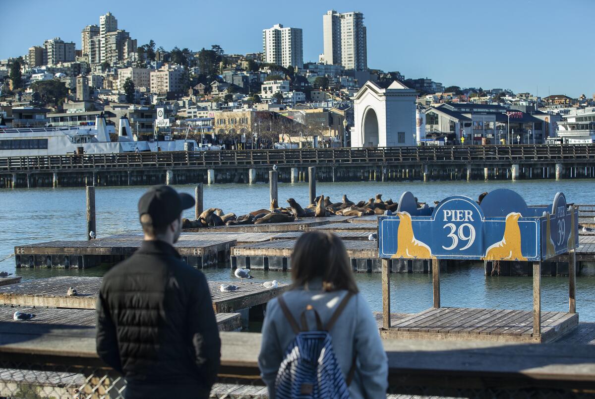 Visitors to Pier 39 in San Francisco