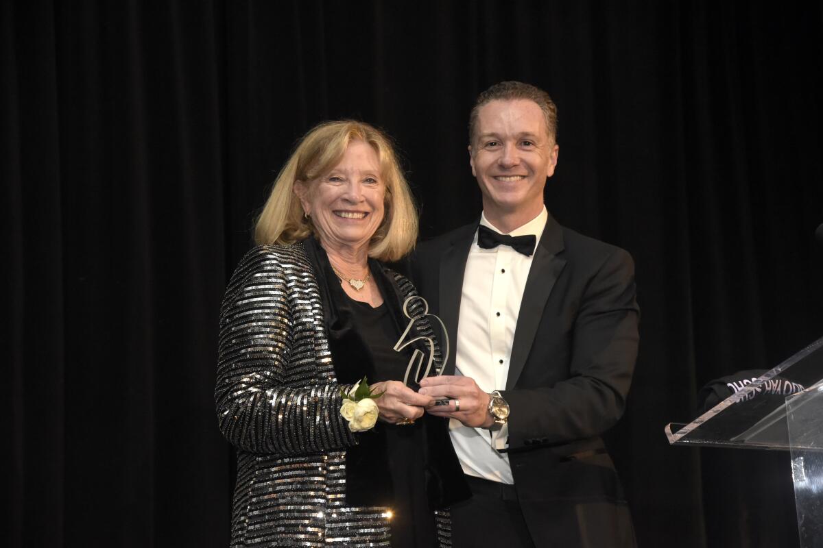 The 2019 UCI MIND honoree Harriet Harris of Newport Beach with UCI MIND Director Joshua D. Grill.