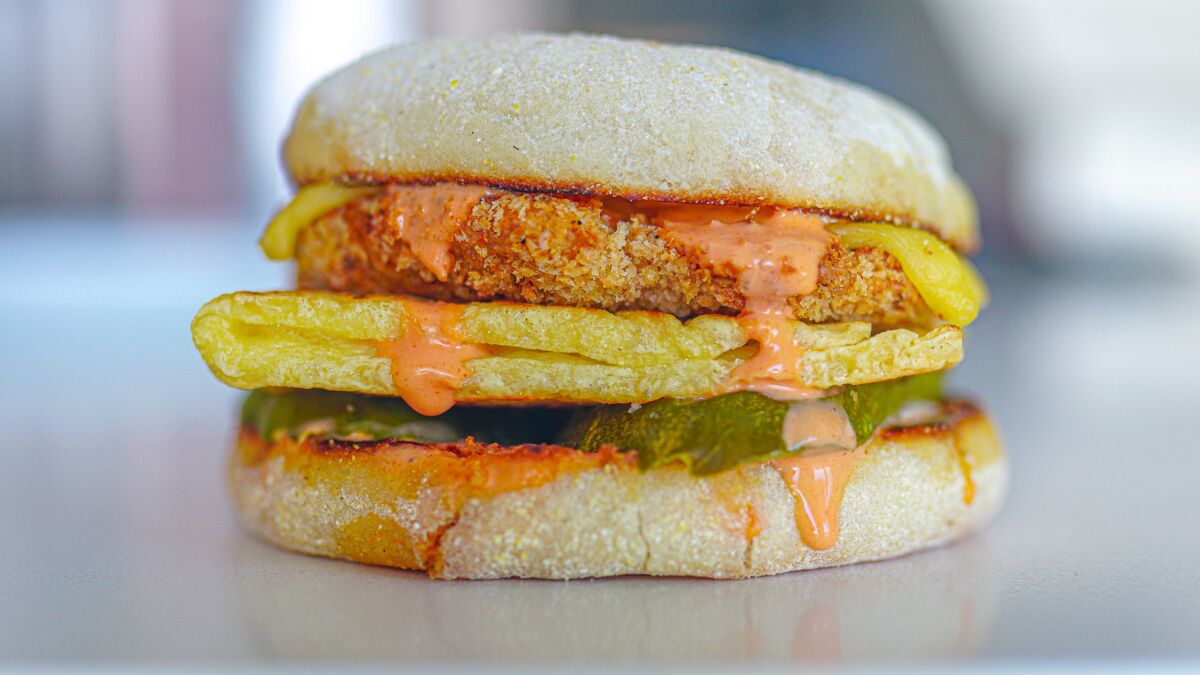 A photo of The Buffalo Chik’n Breakfast Sandwich from Spoiled Vegans Cafe