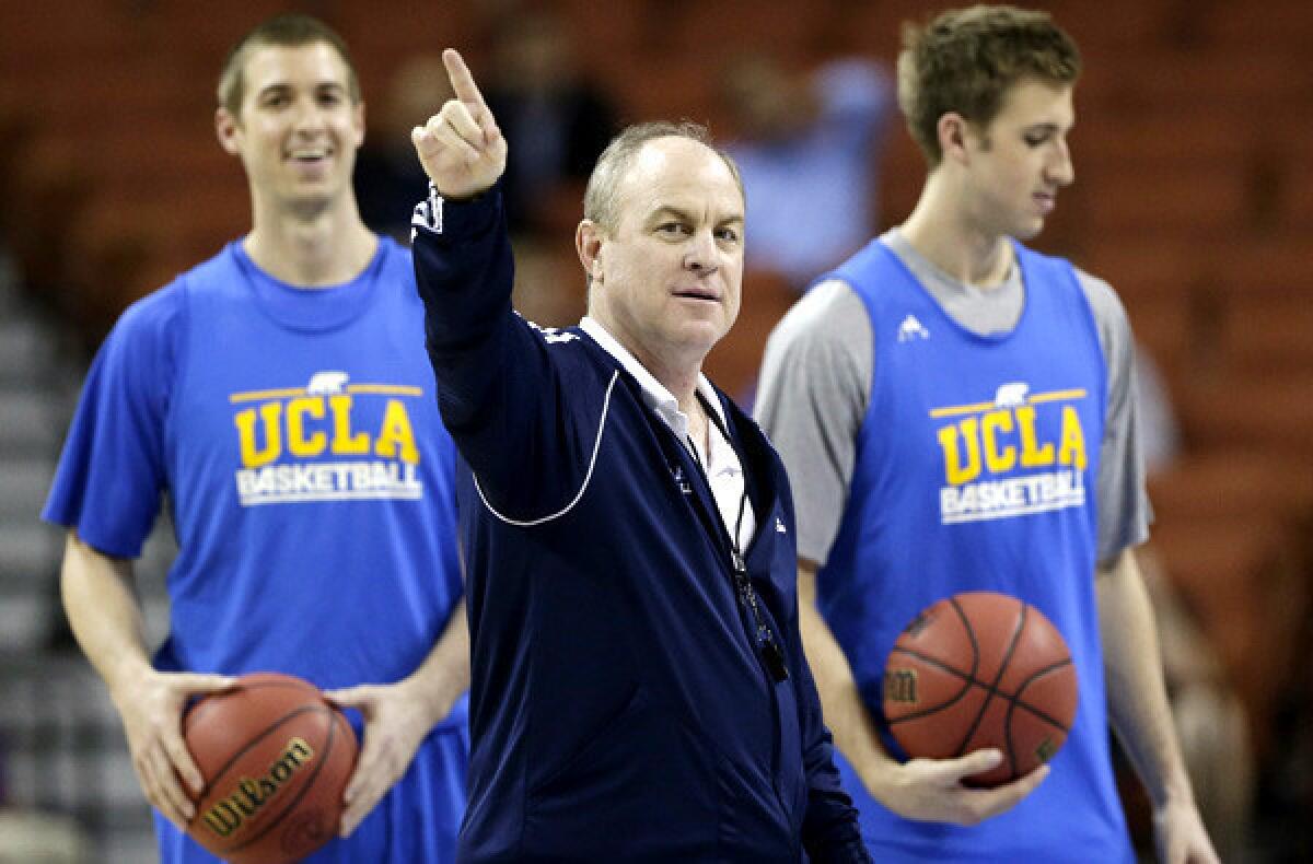 UCLA Coach Ben Howland gives direction during a practice last week.