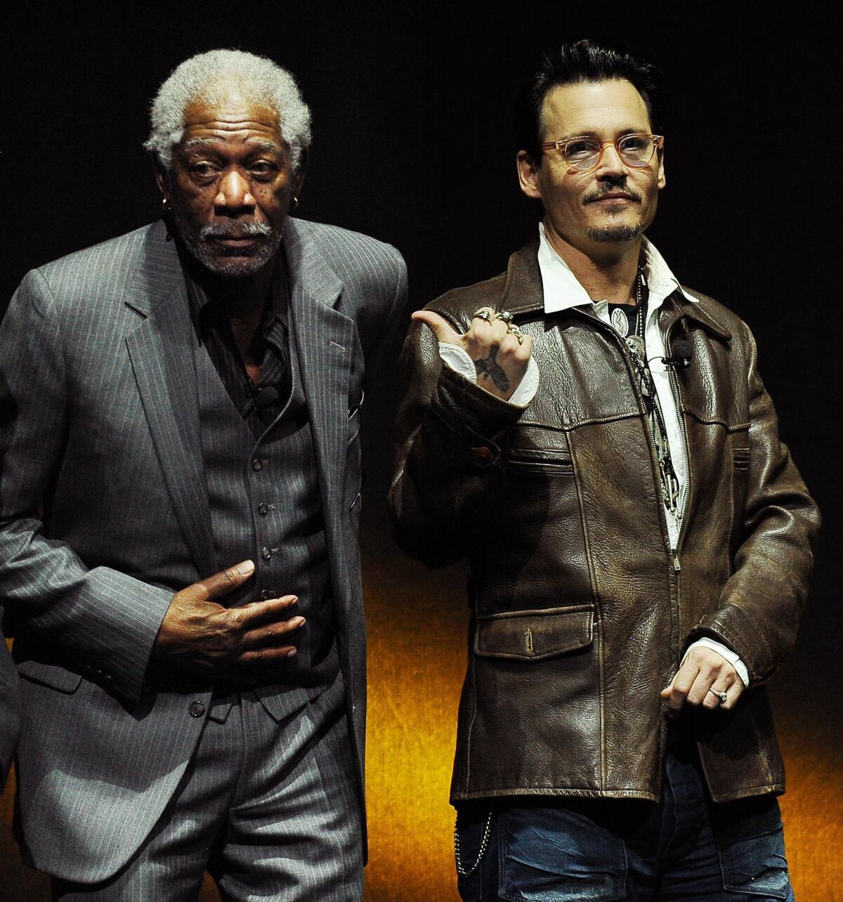 Johnny Depp, right, confirmed engagement rumors in his own roundabout way during a promotional appearance for his upcoming film "Transcendence" in Beijing on Monday. In this photo, Depp, wearing said ring, appears with his Transcendence" costar Morgan Freeman during the Warner Bros. presentation at CinemaCon 2014 in Las Vegas.