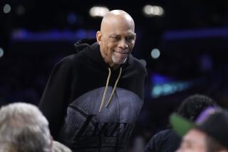 Former Los Angeles Laker Kareem Abdul-Jabbar smiles during the first half in Game 4 of an NBA basketball Western Conference semifinal between the Los Angeles Lakers and the Golden State Warriors Monday, May 8, 2023, in Los Angeles. (AP Photo/Marcio Jose Sanchez)