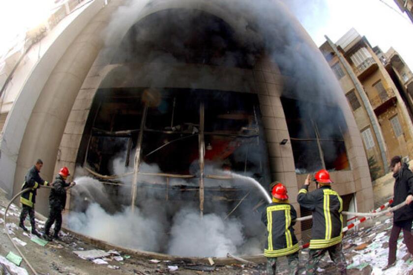 DANISH CONSULATE IN BERUIT: Lebanese firefighters extinguish the fire at the Danish consulate in Beirut, Lebanon, after thousands of Lebanese Muslim protestors stormed and set ablaze the building after the police failed to disperse them, witnesses said.