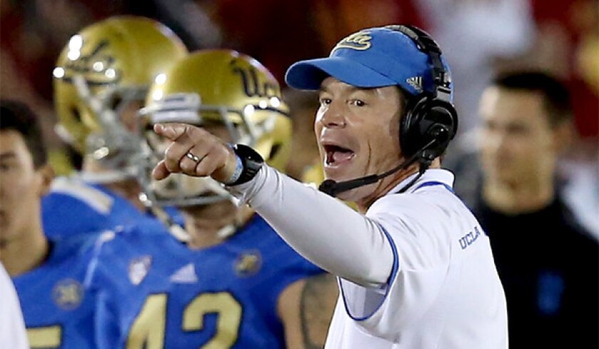 UCLA Coach Jim Mora has led the Bruins to a 9-3 record this season, including a 35-14 win over crosstown rival USC at the Coliseum on Saturday.