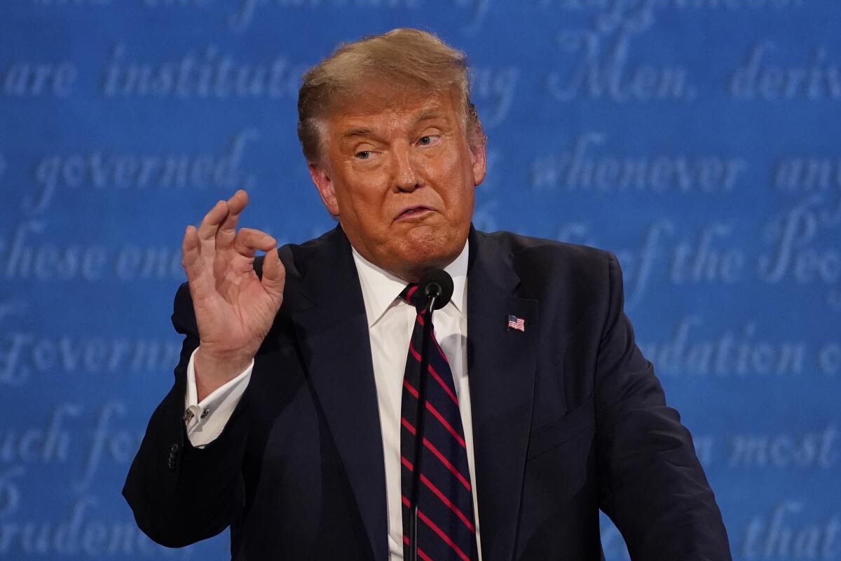President Trump gestures as he speaks at Tuesday's debate in Cleveland.