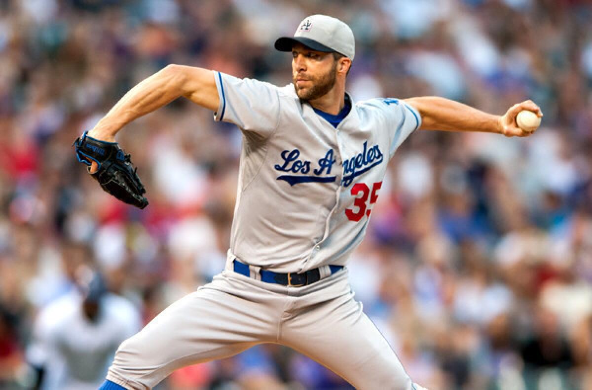 Dodgers starting pitcher Chris Capuano labored through his start against the Rockies on Thursday in Denver, giving up five earned runs and seven hits in 4 1/3 innings.