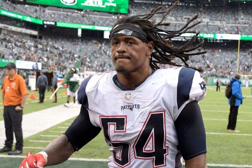 FILE - In this Oct. 15, 2017, file photo, New England Patriots middle linebacker Dont'a Hightower (54) walks off the field after the Patriots defeated the New York Jets 24-17 in an NFL football game in East Rutherford, N.J. A person familiar with the situation says the Hightower will miss Sundayâs game against the Los Angeles Chargers and is facing season-ending surgery on his right shoulder. The surgery will be for a torn pectoral muscle, the person told The Associated Press on the condition of anonymity Thursday, Oct. 26, 2017, because it has not yet been announced by the team. (AP Photo/Bill Kostroun, File)