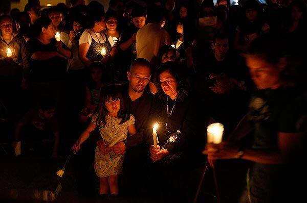 Candlelight vigil for teacher Rigoberto Ruelas