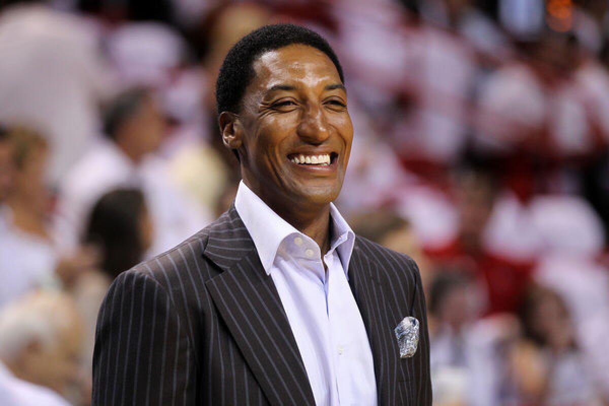 Former Chicago Bulls star Scottie Pippen watches as the Bulls play the Miami Heat during the 2011 NBA playoffs.