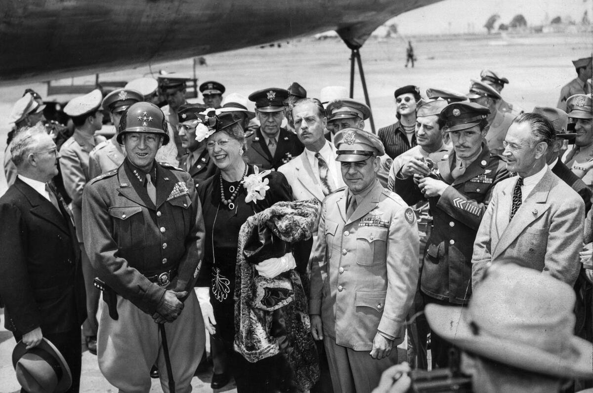 June 9, 1945: After arrival in Los Angeles from Denver, Mayor Fletcher Bowron, left, welcomes Gen. George S. Patton Jr., Anne Patton, the general's sister, and Lt. Gen. James Doolittle.