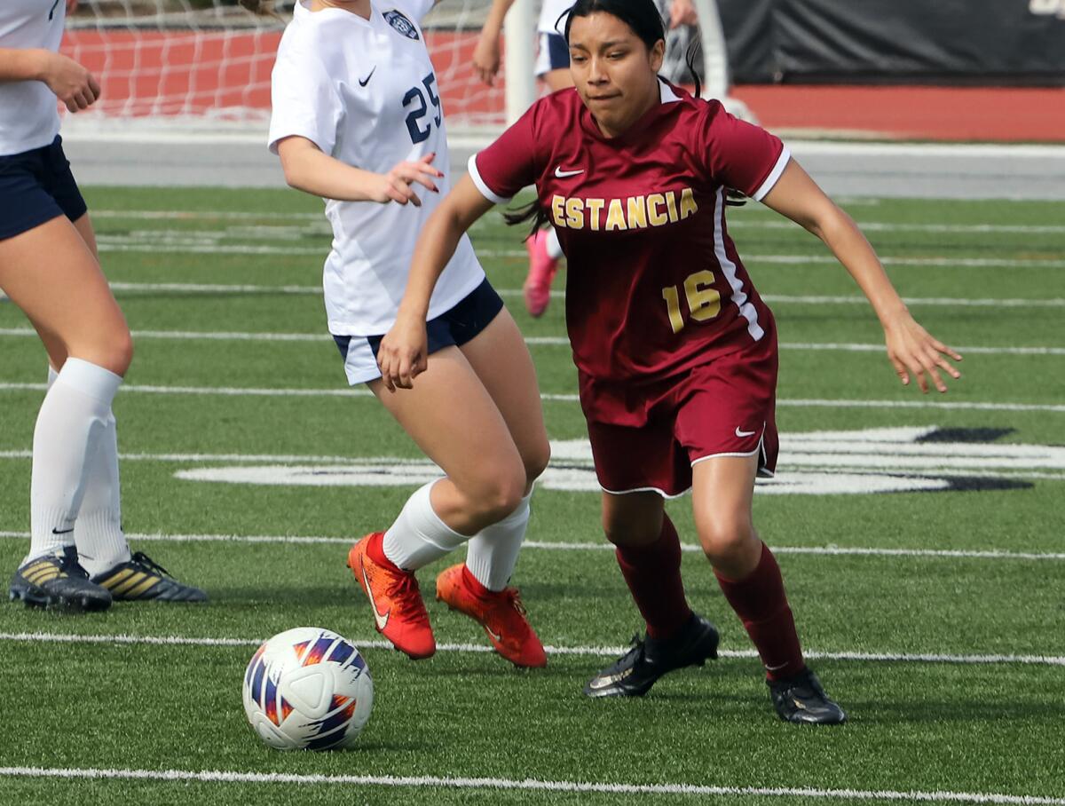Estancia's Heidi Nieto (16) breaks away from Campbell Hall's defenders during Saturday's Division 5 title match.