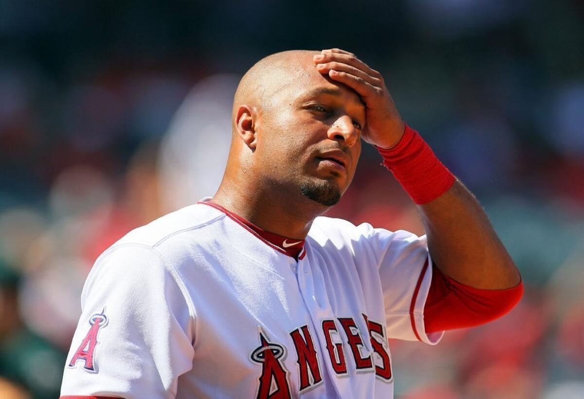 Vernon Wells will be wearing pinstripes instead of an Angels uniform.