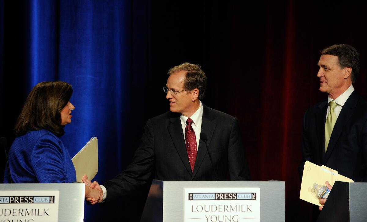 Georgia Secretary of State Karen Handel, Rep. Jack Kingston, center, and former Dollar General CEO David Perdue after a debate. The Republicans are competing for a Senate seat.
