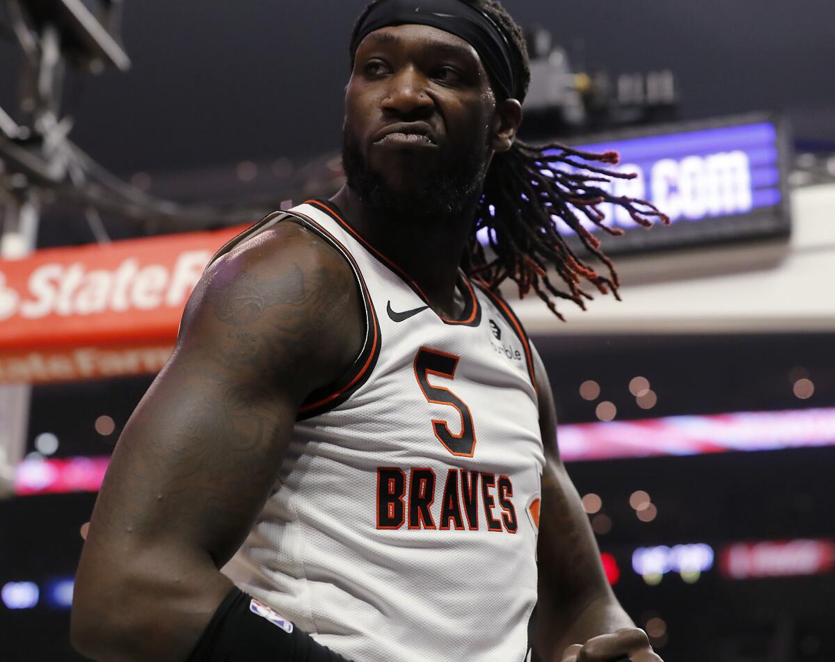 Clippers forward Montrezl Harrell reacts after scoring a basket against the Portland Trail Blazers at Staples Center on Dec. 3, 2019.