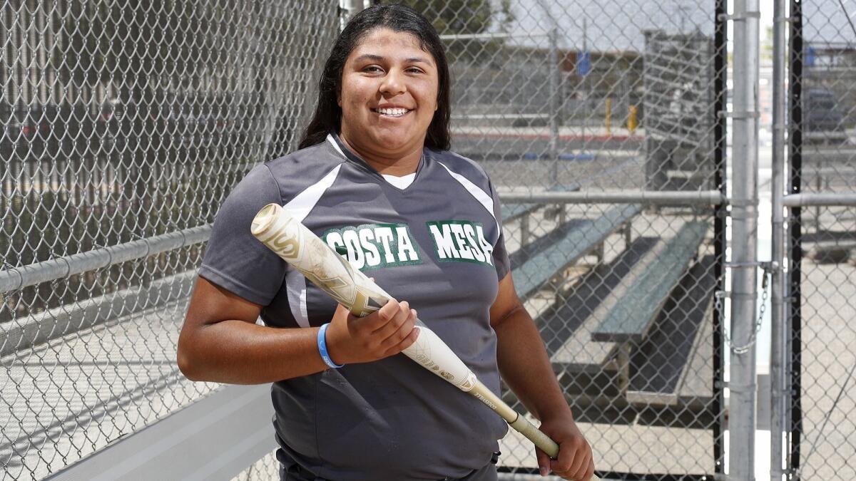 Costa Mesa High senior outfielder Katie Belmontes went four for five with two home runs and nine RBIs in the Battle for the Bell game against Estancia.