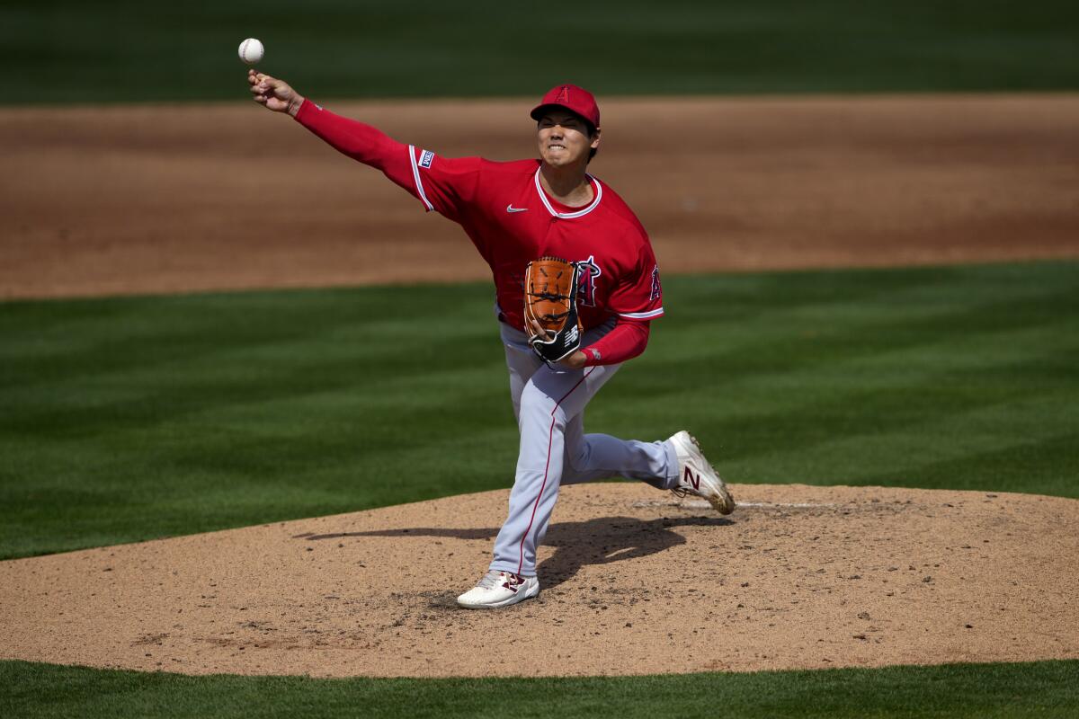 Angels starting pitcher Shohei Ohtani throws against the Oakland Athletics.