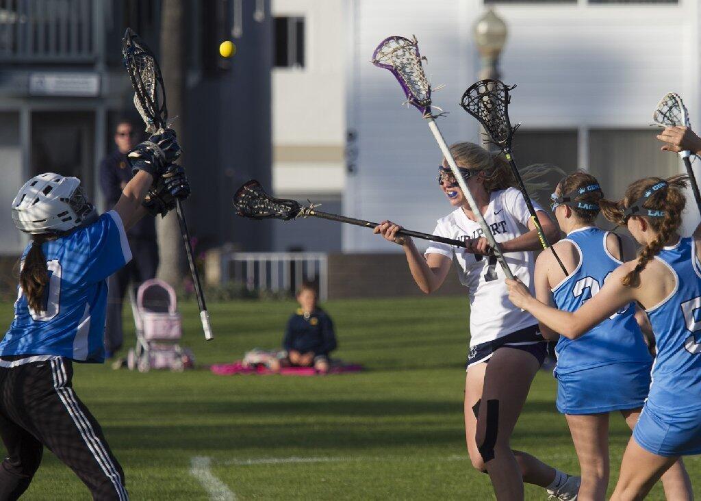 Newport Harbor High's Sarah Farley shoots and scores during the Battle of the Bay.