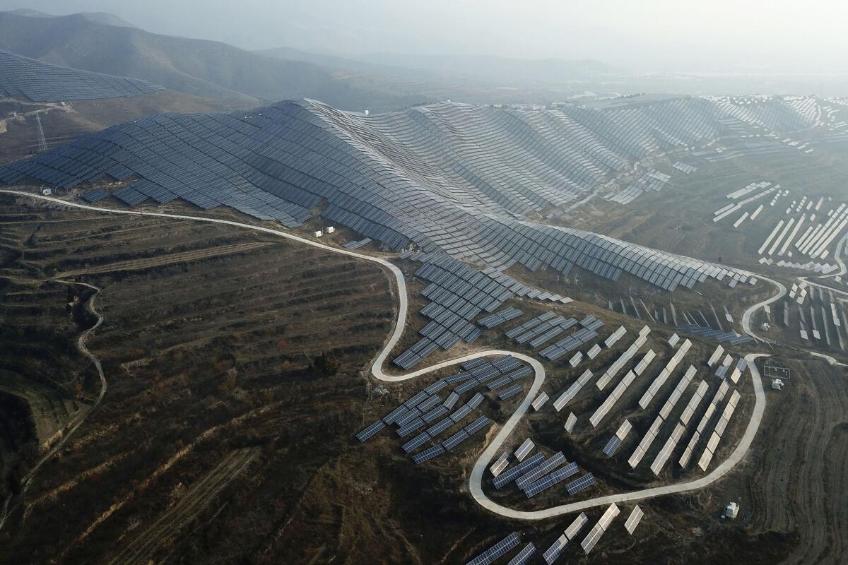 Solar panels on hills.