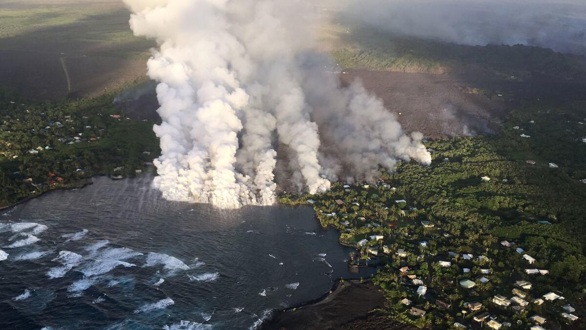 Lava enters Kapoho Bay near Hawaii island’s eastern tip on Monday.