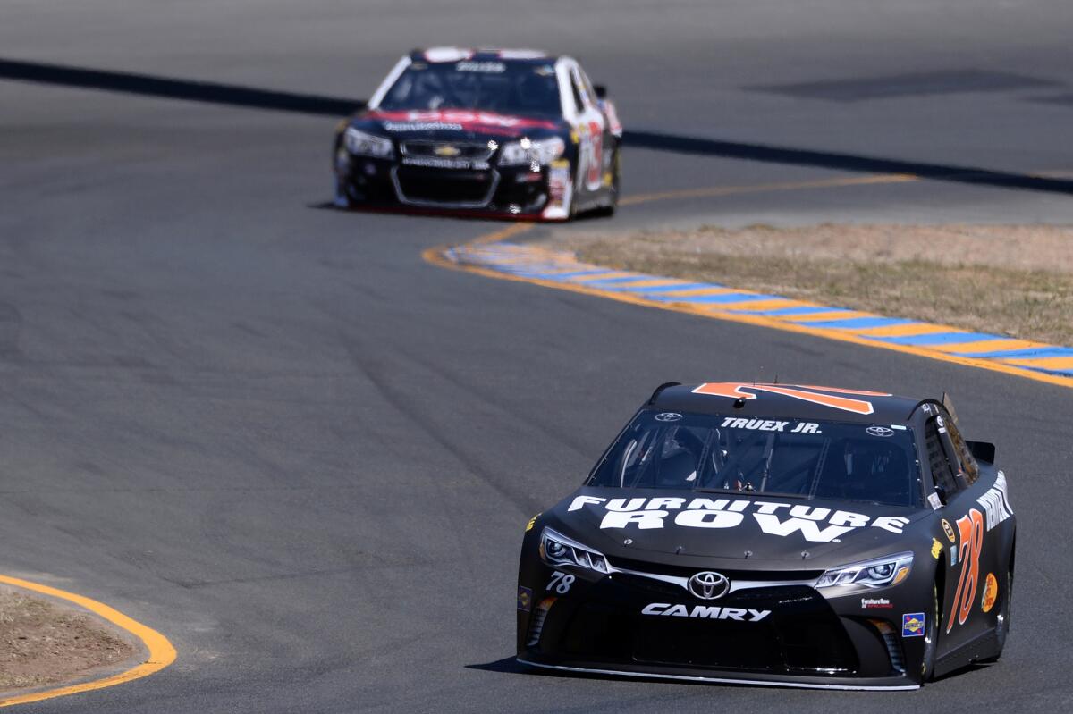 Martin Truex Jr., driver of the #78 Furniture Row Toyota, practices for the NASCAR Sprint Cup race at Sonoma Raceway.