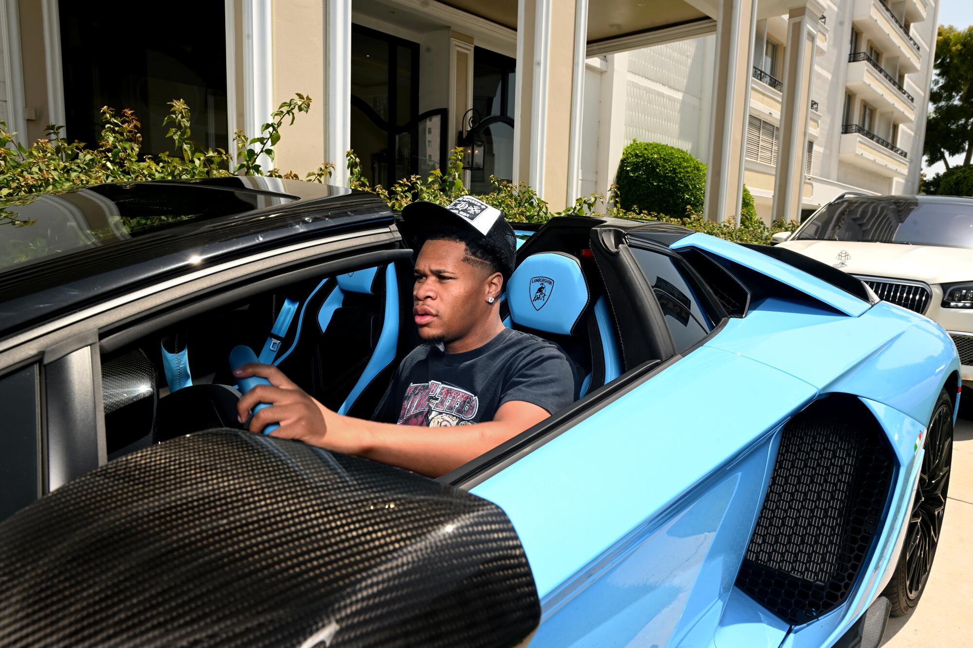 Boxer Devin Haney drives his Lamborghini in West Los Angeles. 