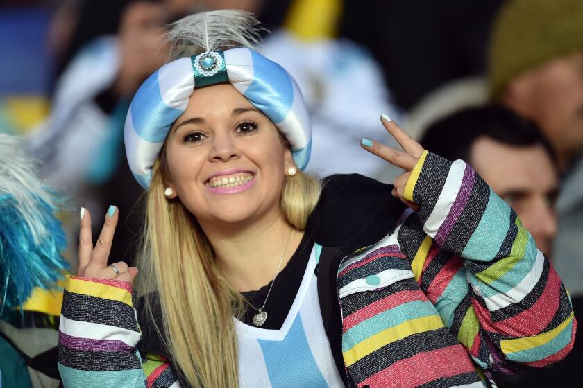 A supporter of Argentina waits for the start of the Copa America semifinal football match against Paraguay in Concepcion, Chile on June 30, 2015. AFP PHOTO / YURI CORTEZYURI CORTEZ/AFP/Getty Images ** OUTS - ELSENT, FPG - OUTS * NM, PH, VA if sourced by CT, LA or MoD **