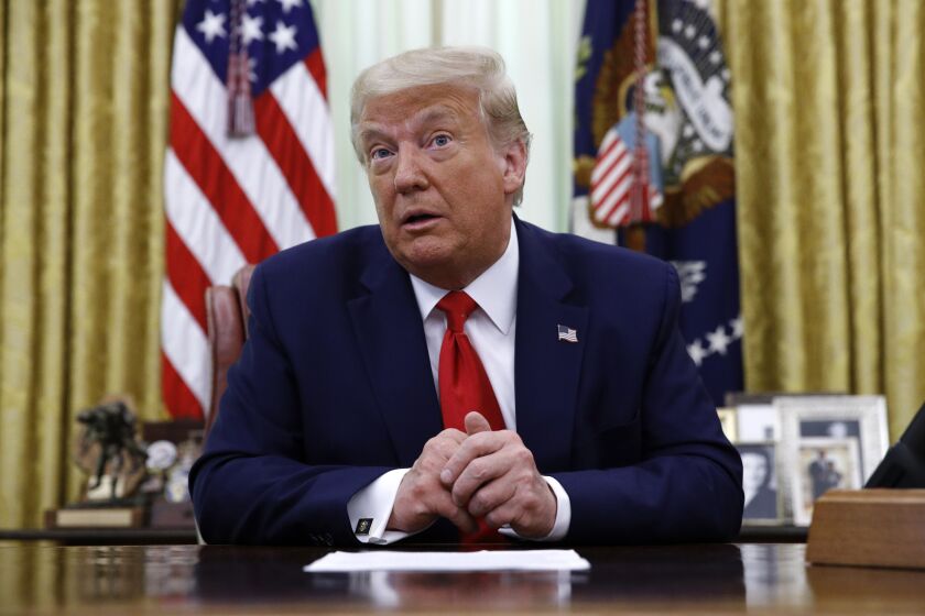 President Donald Trump speaks during a law enforcement briefing on the MS-13 gang in the Oval Office of the White House, Wednesday, July 15, 2020, in Washington. (AP Photo/Patrick Semansky)